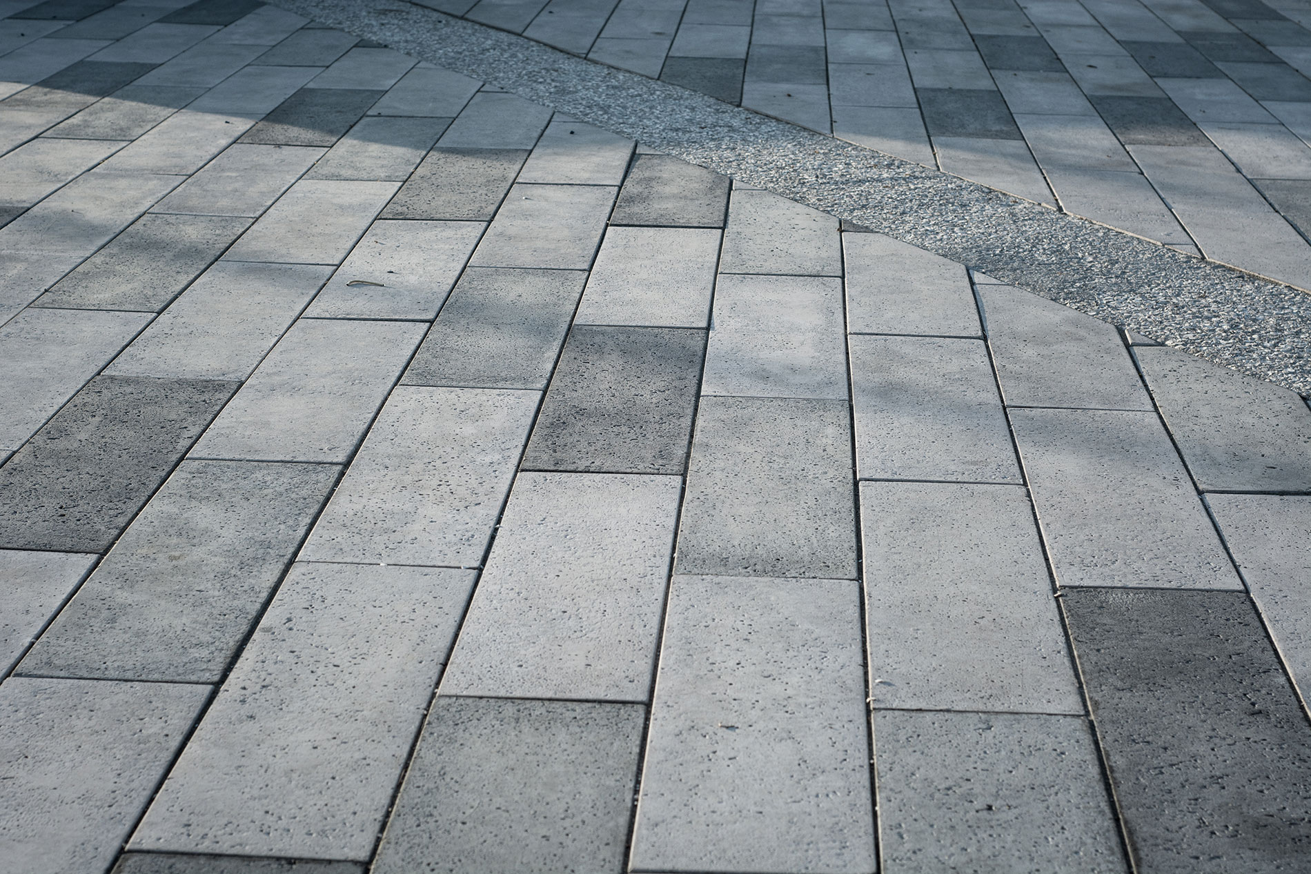 Waypoint Construction Group used several paver colors to give the hardscape pattern