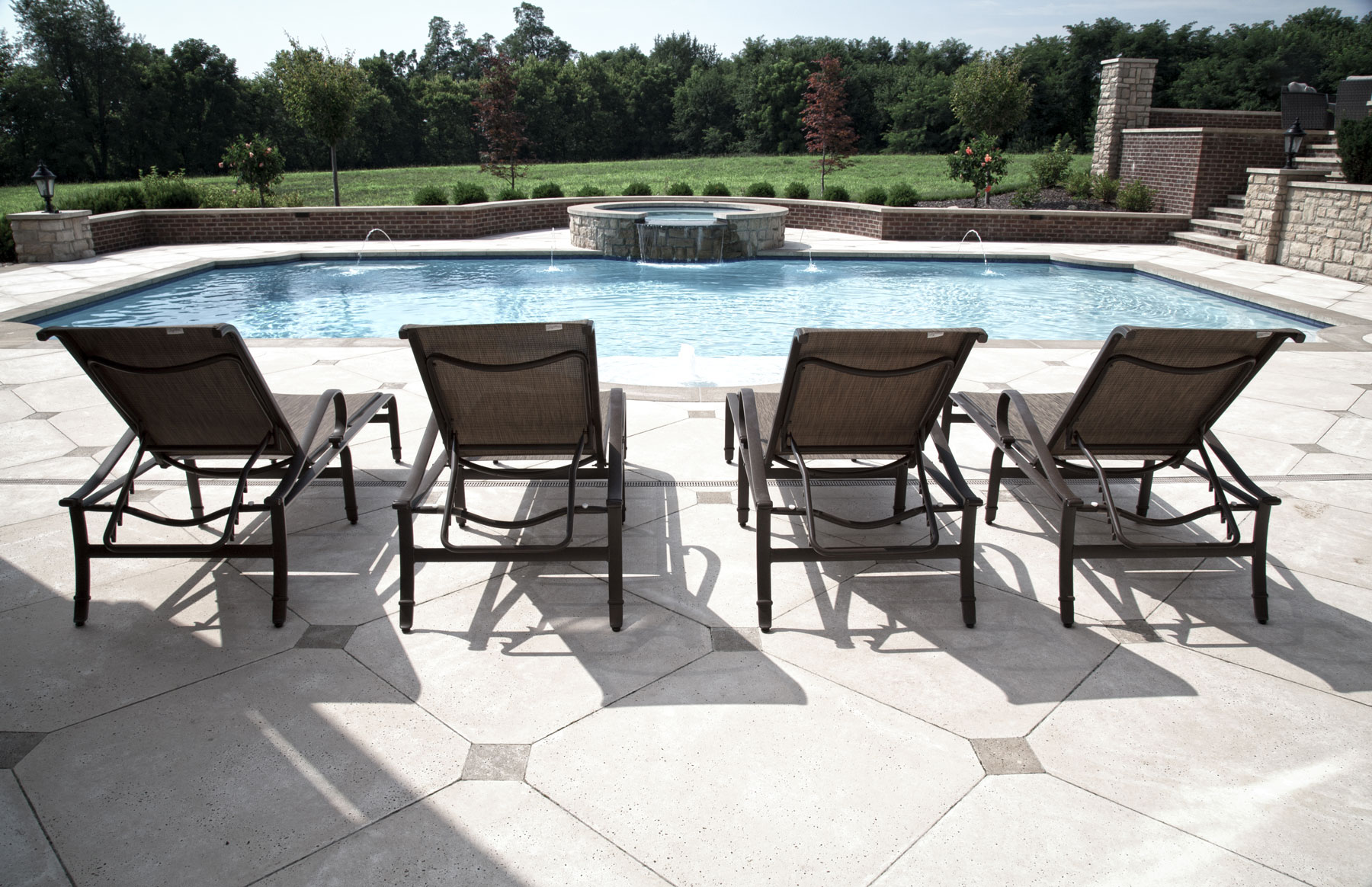 The rectangle pavers by Rushing Design mesh into the pool pavers