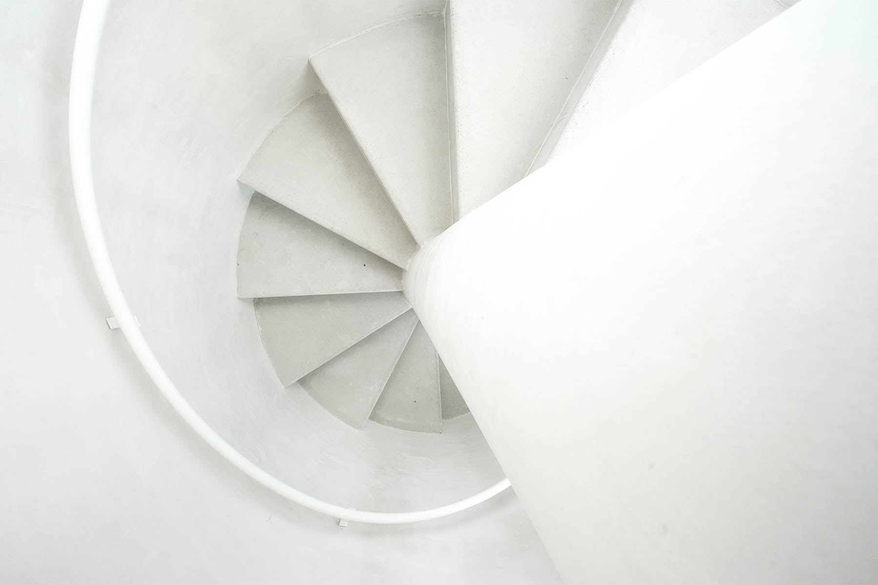 Top-down view of the spiral concrete staircase